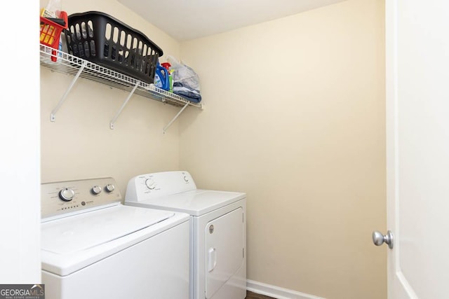 washroom featuring independent washer and dryer