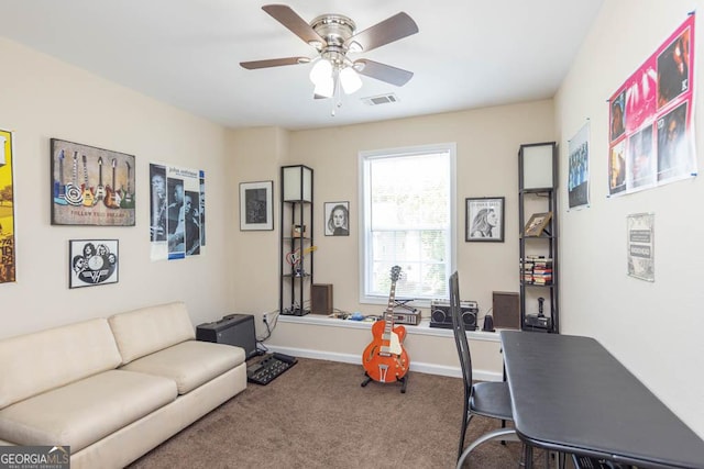 interior space with ceiling fan