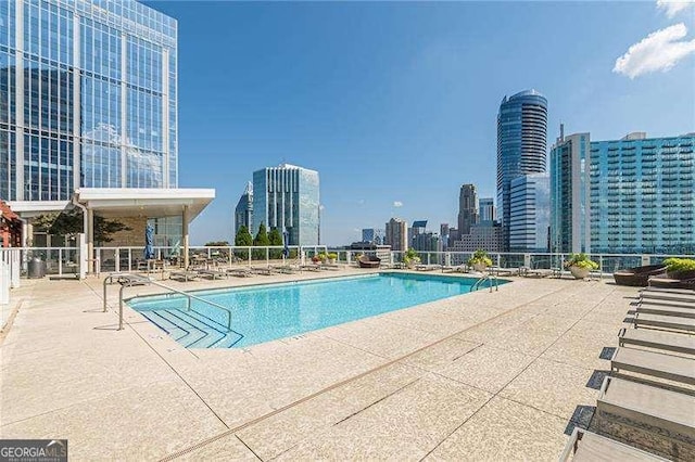 view of pool featuring a patio area