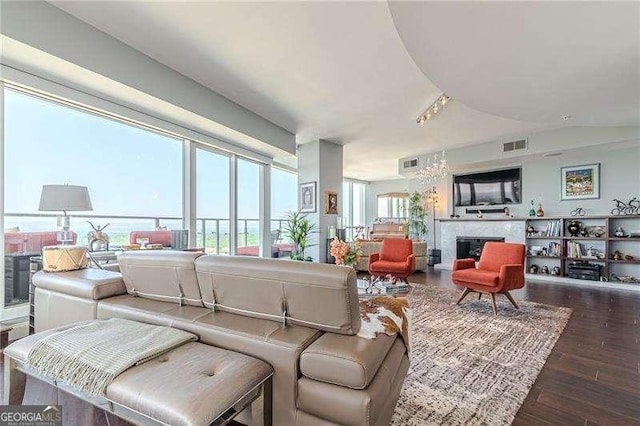 living room with dark hardwood / wood-style floors