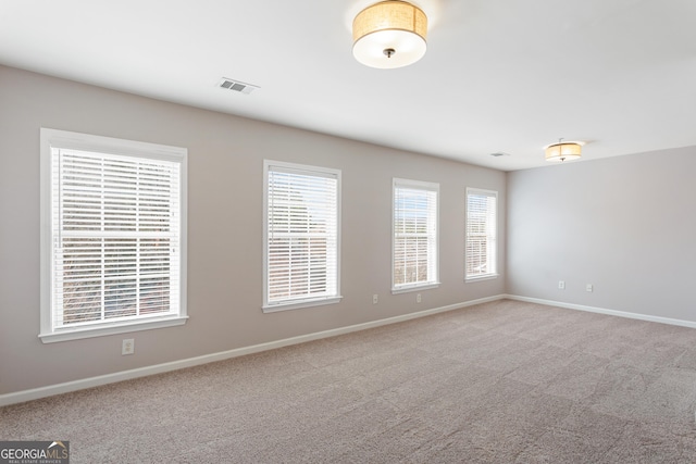 view of carpeted spare room