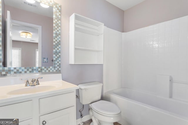 full bathroom with vanity, bathing tub / shower combination, and toilet