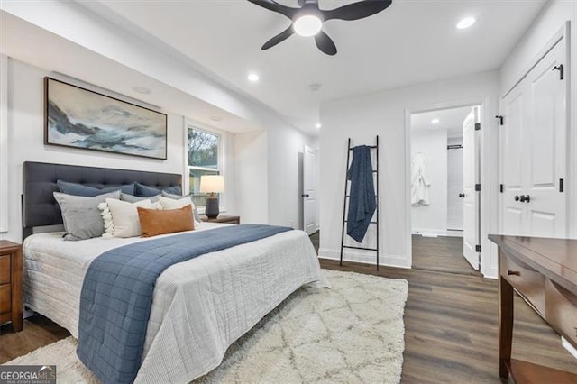 bedroom with dark wood-type flooring and ceiling fan