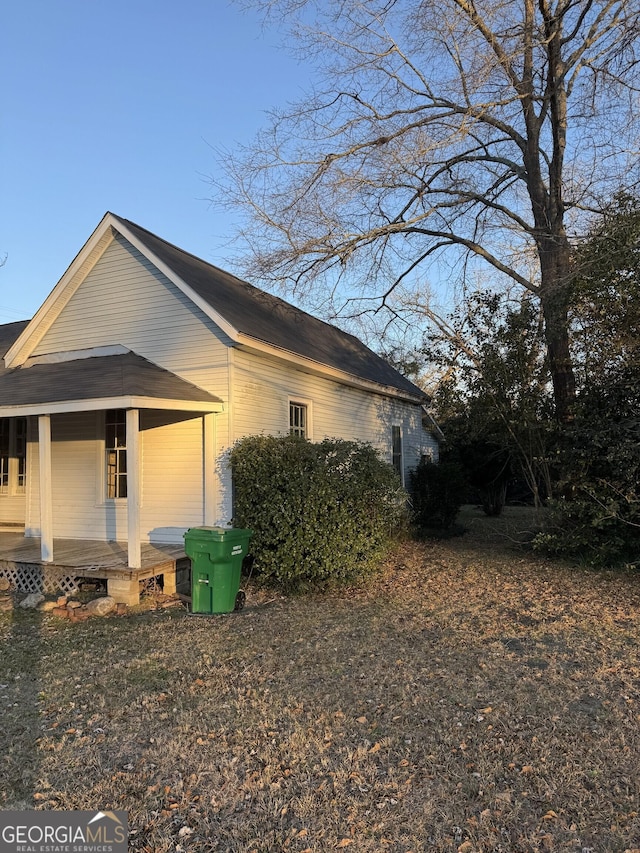 view of home's exterior featuring covered porch