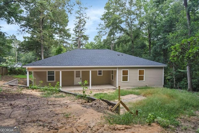 back of property featuring a patio area