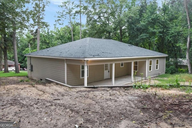 back of house featuring a patio area