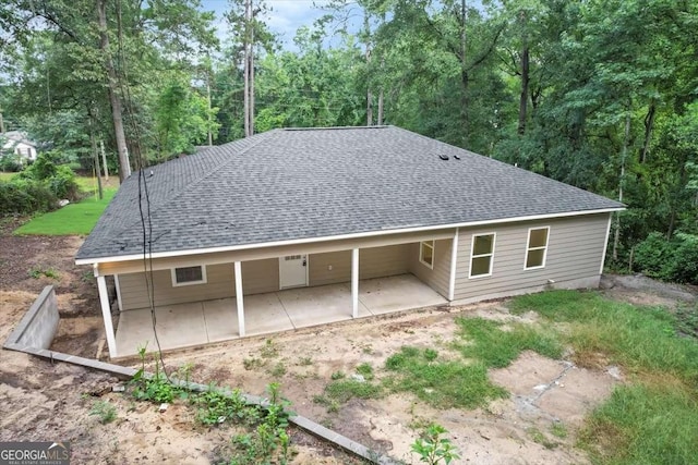 back of property featuring a patio area