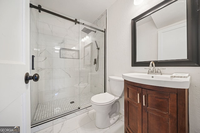 bathroom featuring vanity, toilet, and a shower with shower door