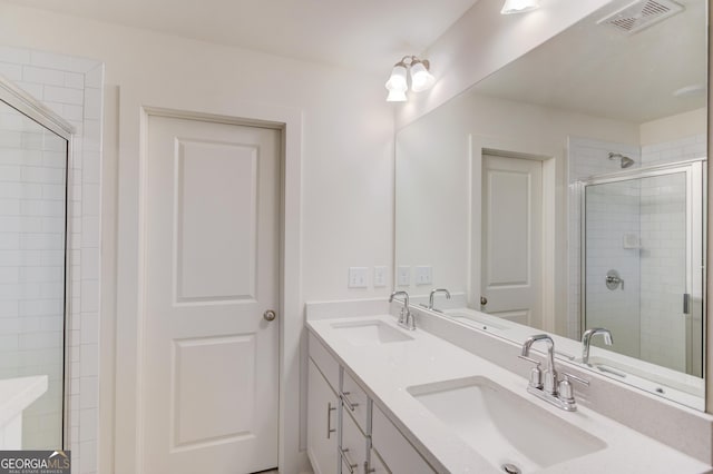 bathroom featuring vanity and walk in shower