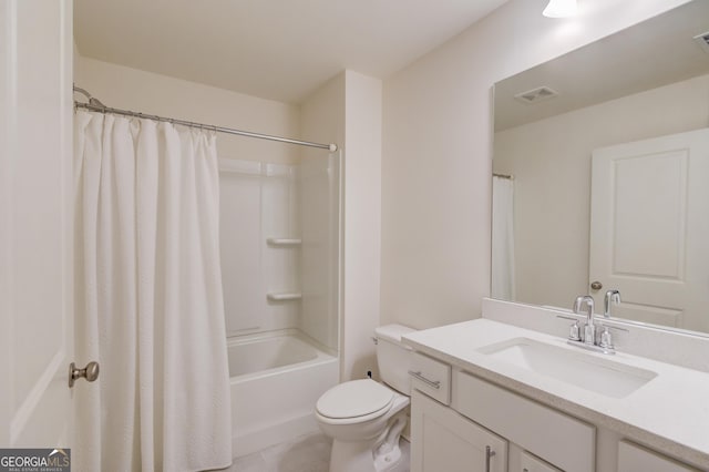 full bathroom with vanity, shower / bath combo, tile patterned floors, and toilet