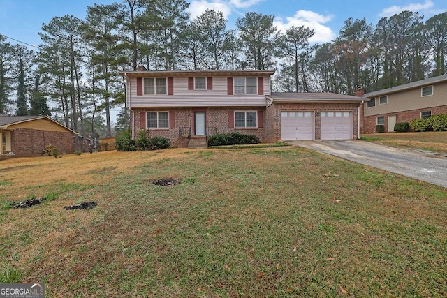 view of front facade with a garage and a front yard