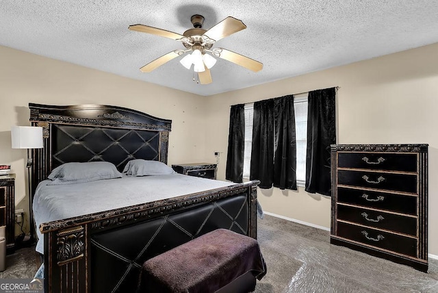 bedroom featuring ceiling fan and a textured ceiling