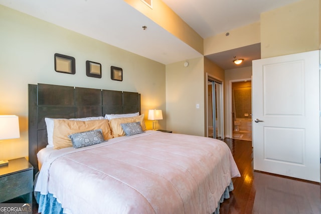 bedroom featuring dark wood-type flooring