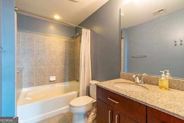 full bathroom with shower / bathtub combination with curtain, vanity, and toilet