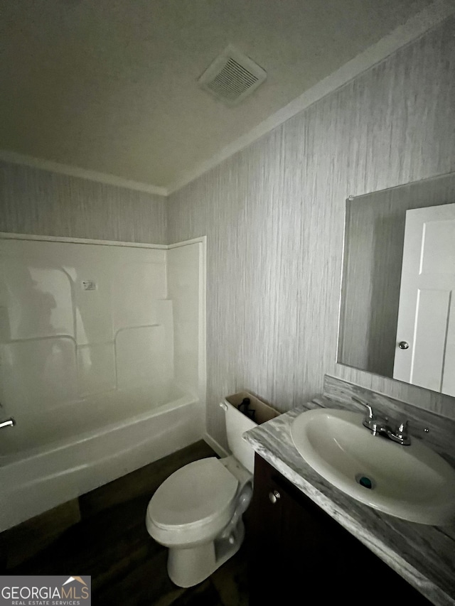 full bathroom with vanity,  shower combination, and toilet