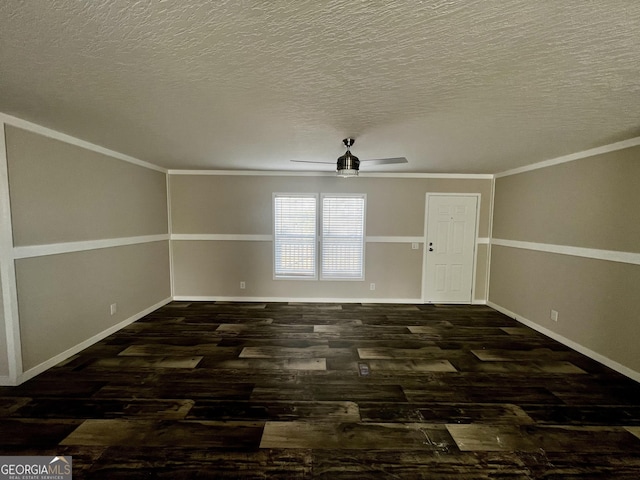 unfurnished room featuring a textured ceiling, ornamental molding, dark hardwood / wood-style floors, and ceiling fan