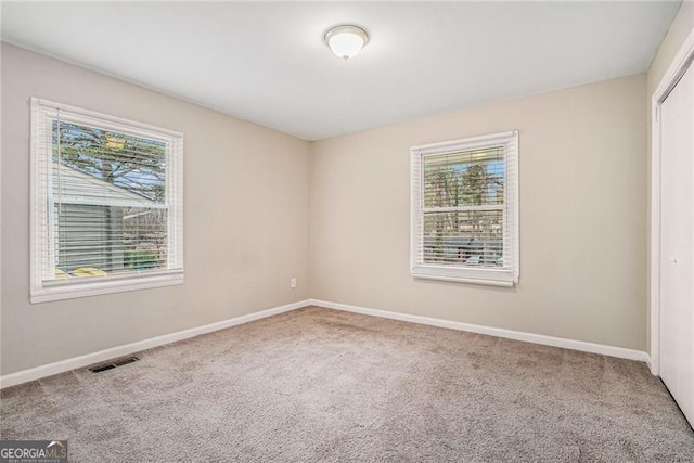 view of carpeted spare room