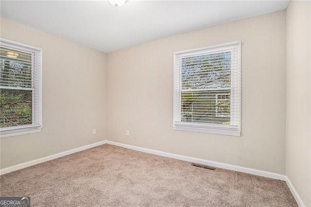 view of carpeted spare room