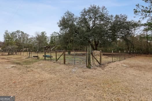 exterior space with a rural view