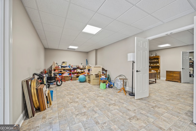 basement with a drop ceiling