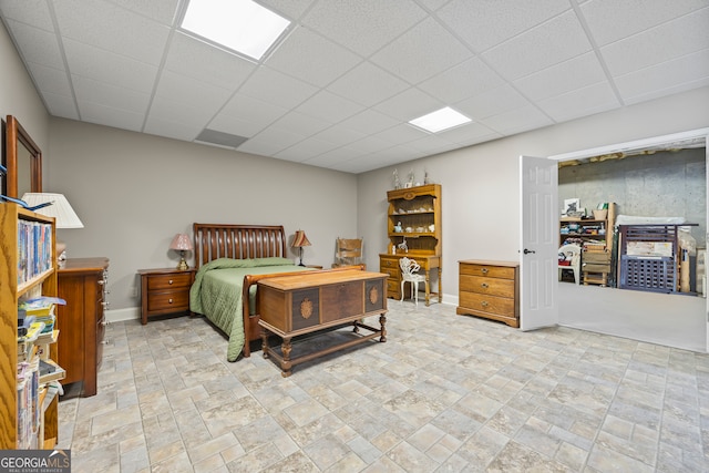 bedroom featuring a paneled ceiling