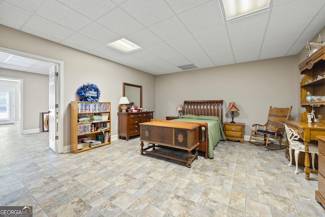 bedroom featuring a drop ceiling