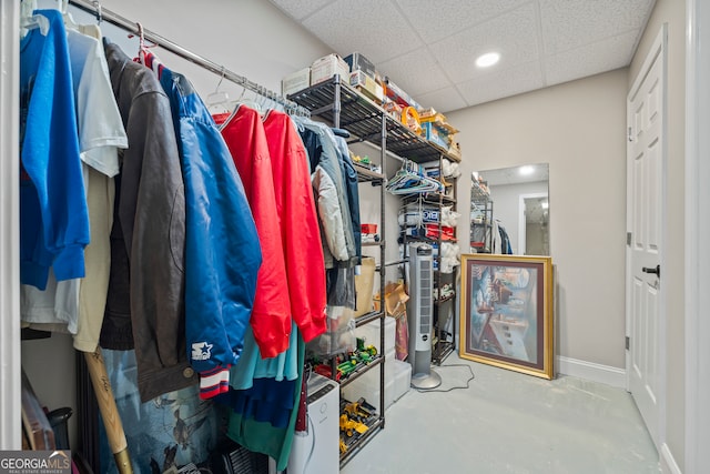 walk in closet featuring a drop ceiling