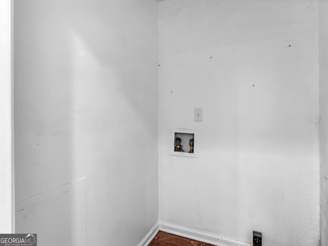 washroom with hookup for an electric dryer and hookup for a washing machine