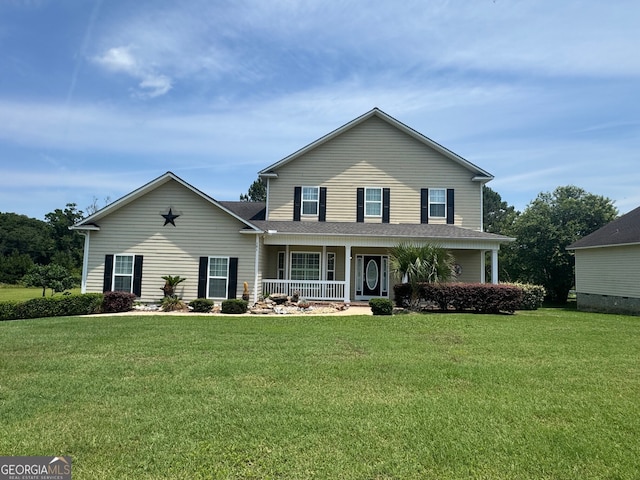 101 Willow Ridge Cir, Thomasville, GA 31757 - traditional-style house with a porch and a front lawn