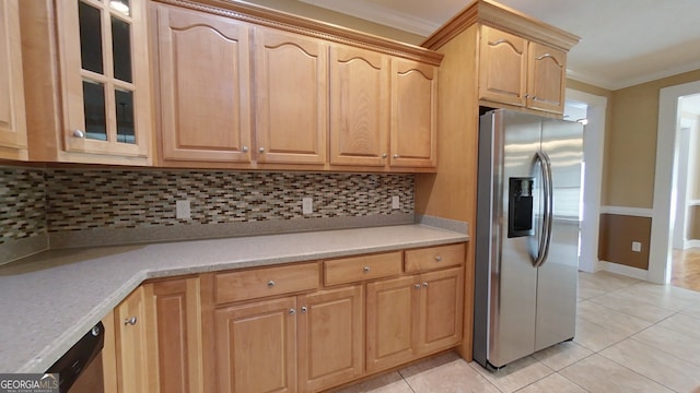 kitchen featuring light brown cabinetry, stainless steel fridge with ice dispenser, light tile patterned floors, ornamental molding, and backsplash