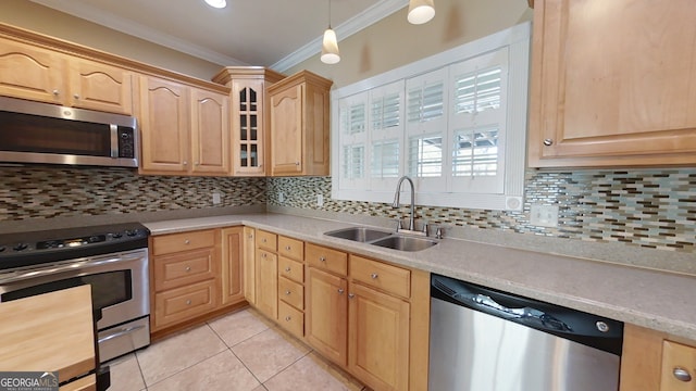 101 Willow Ridge Cir, Thomasville, GA 31757 - kitchen with appliances with stainless steel finishes, a sink, crown molding, light brown cabinets, and light countertops