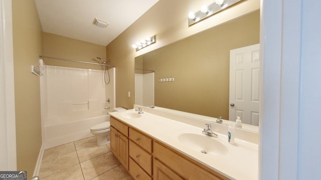 full bathroom featuring  shower combination, vanity, tile patterned floors, and toilet