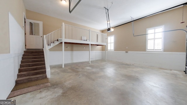 101 Willow Ridge Cir, Thomasville, GA 31757 - garage with a garage door opener and wainscoting