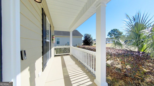 balcony featuring covered porch