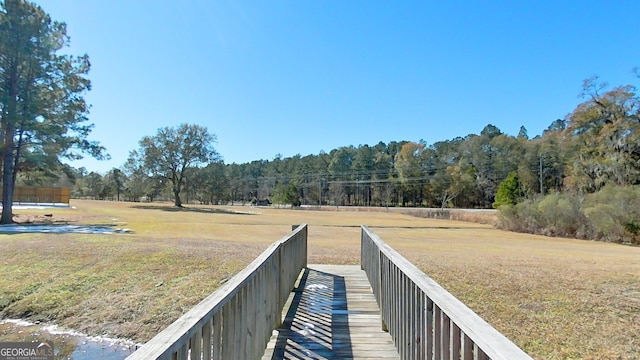 view of community featuring a yard