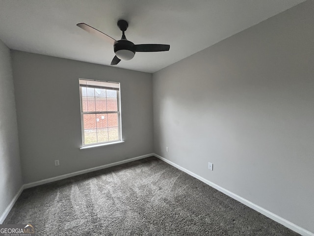 spare room with carpet flooring and ceiling fan