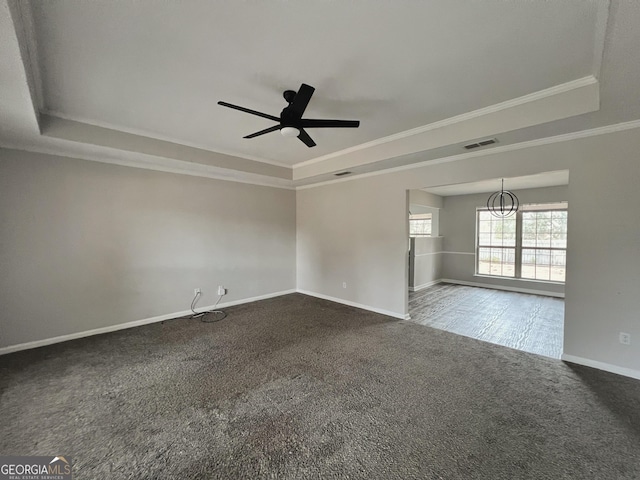 305 Clairemore Cir, Hinesville, GA 31313 - empty room featuring visible vents, a raised ceiling, crown molding, and carpet floors