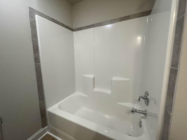 bathroom featuring shower / washtub combination