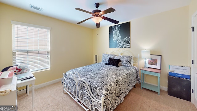 bedroom featuring ceiling fan and carpet flooring