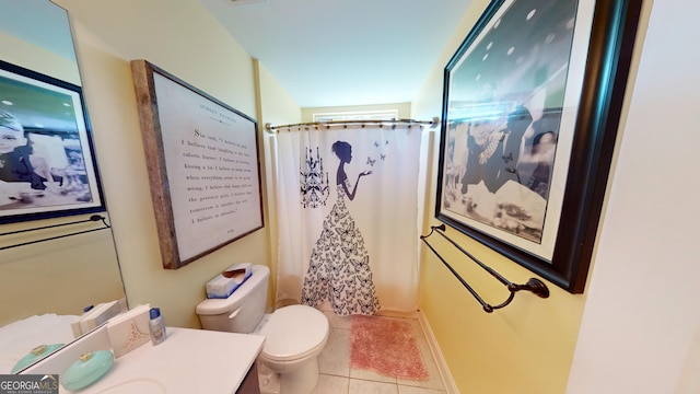 bathroom with vanity, toilet, curtained shower, and tile patterned flooring