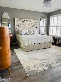 bedroom featuring dark hardwood / wood-style floors