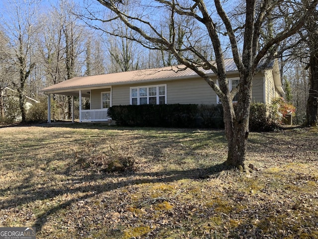 ranch-style home with covered porch