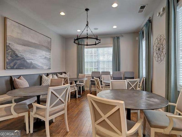 dining area with hardwood / wood-style flooring and breakfast area