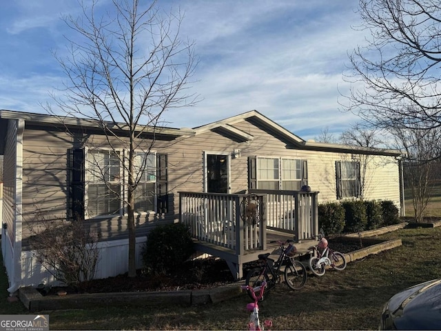 view of front of property with a deck