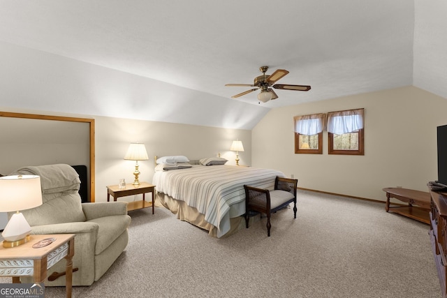 carpeted bedroom featuring ceiling fan and lofted ceiling