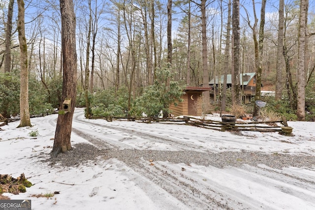 view of yard covered in snow