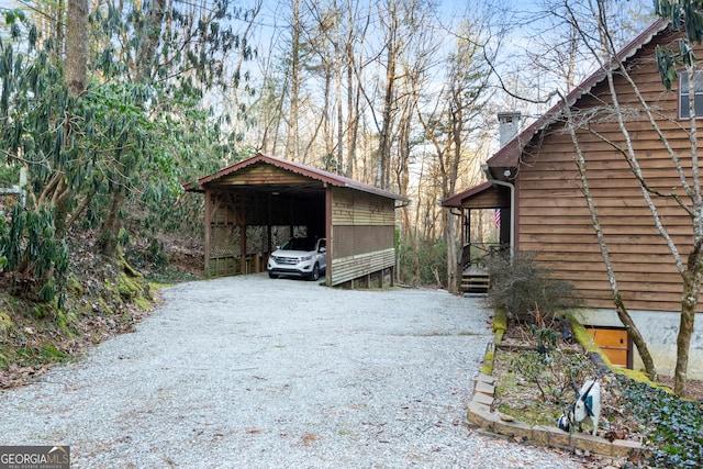 view of property exterior featuring a carport