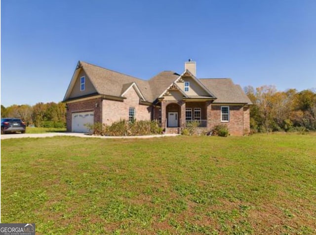 view of front facade with a garage and a front lawn