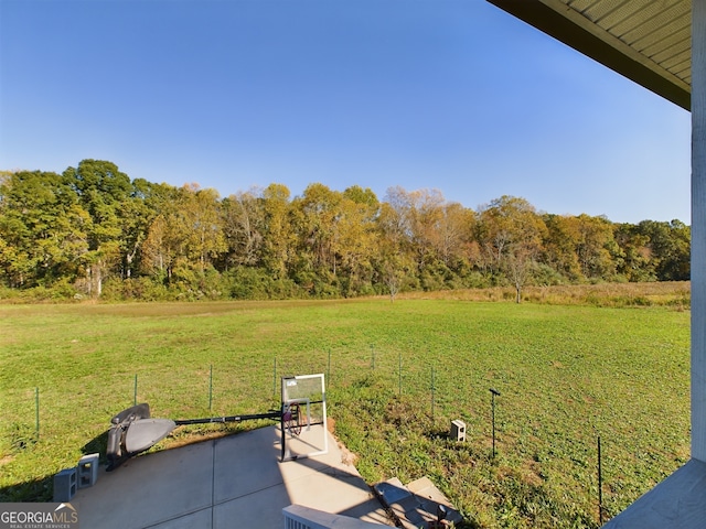 view of yard with a rural view