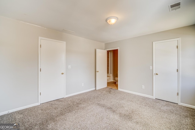 spare room with carpet flooring